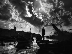 Lone Figura on the Quay